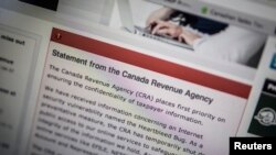 FILE - The Canada Revenue Agency website is seen on a computer screen in Toronto, April 9, 2014.