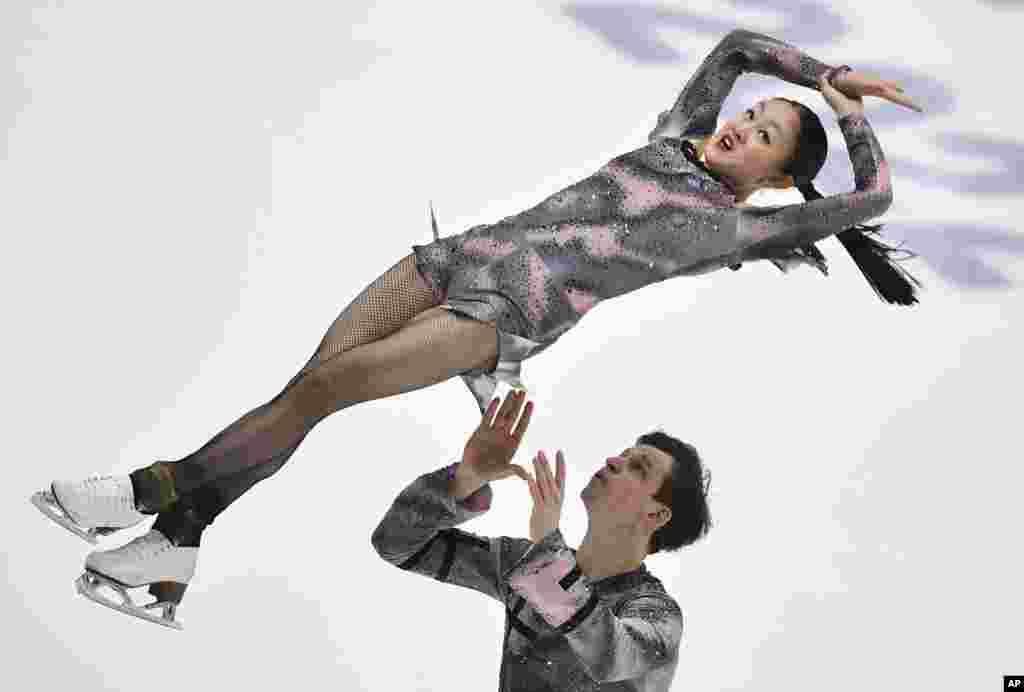 Audrey Lu and Misha Mitrofanov of USA compete in the short program during the ISU Four Continents Figure Skating Championships in Tallinn, Estonia.