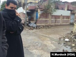 Outside a bombed house in Mishraq, eastern Mosul, the smell of what police say was a bomb infused with homemade chemical poisons is strong five days after the blast on March 4, 2017.