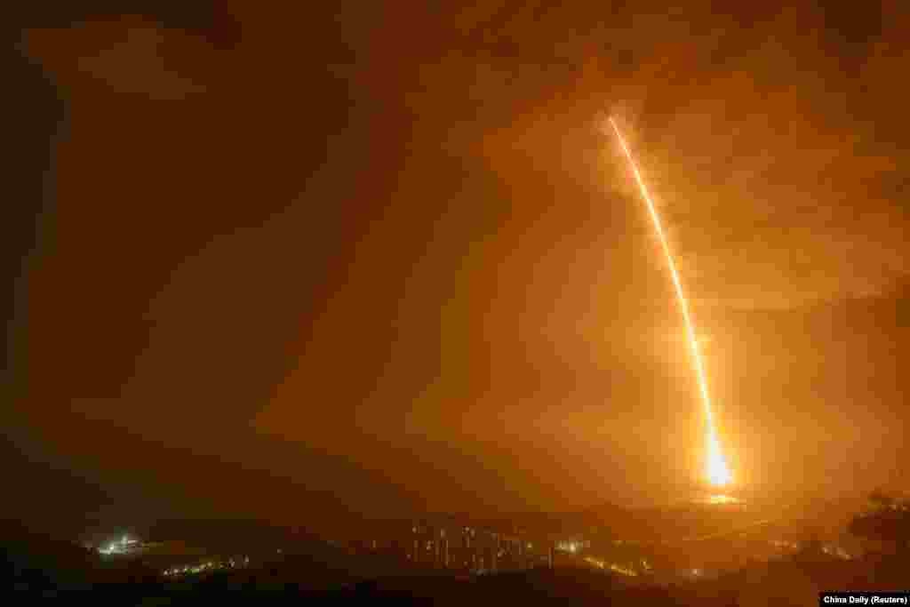 The Long March-7 Y3 rocket carrying the automated cargo resupply spacecraft Tianzhou-2 as one of the missions to complete China&#39;s space station, takes off from Wenchang Space Launch Center in Hainan province, May 29, 2021.