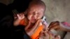 FILE - A Somali baby cries while receiving a five-in-one vaccine against several potentially fatal childhood diseases, at the Medina Maternal Child Health center in Mogadishu, Somalia .