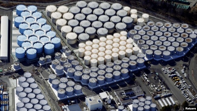 An aerial view shows the storage tanks for treated water at the tsunami-crippled Fukushima Daiichi nuclear power plant in Okuma town, Fukushima prefecture, Japan, on February 13, 2021. (Kyodo/via REUTERS)