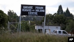 FILE - An image taken Apr. 15, 2010, shows a sign posted outside Harare Prison in Harare, Zimbabwe.