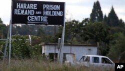 FILE - An image taken Apr. 15, 2010, shows a sign posted outside Harare Prison in Harare, Zimbabwe.