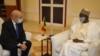 FILE - French Foreign Minister Jean-Yves Le Drian (L) during an official visit with the interim President of Mali Bah Ndaw (R) in Bamako, Oct. 25, 2020. (Malian Presidency via AFP)