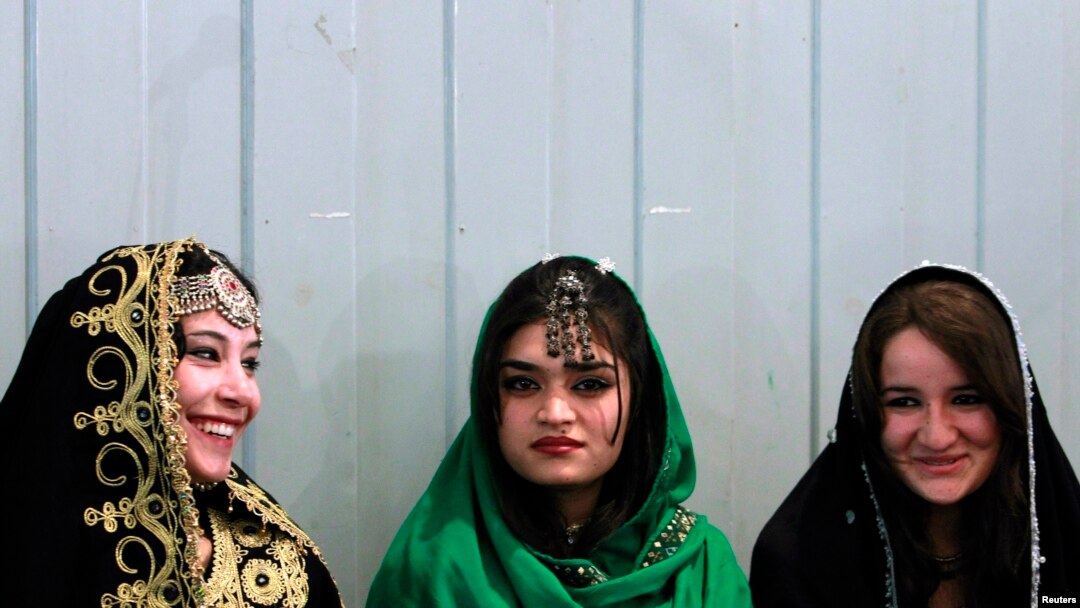 FILE - Young Afghan women attend teachers' graduation ceremony, Kabul, March 30, 2011.