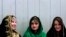 Young Afghan women attend teachers' graduation ceremony, Kabul, March 30, 2011.