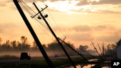 Tiang-tiang listrik yang roboh diterjang Badai Ida di Reserve, Louisiana, Jumat, 3 September 2021. 