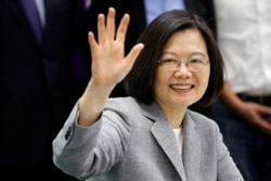 FILE - Taiwan President Tsai Ing-wen attends a ceremony to sign up for Democratic Progressive Party's 2020 presidential candidate nomination in Taipei, Taiwan, March 21, 2019.