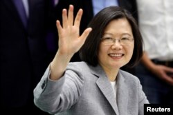 FILE - Taiwan President Tsai Ing-wen attends a ceremony to sign up for Democratic Progressive Party's 2020 presidential candidate nomination in Taipei, Taiwan, March 21, 2019.
