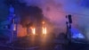 TOPSHOT - This handout photograph taken and released by the State Emergency Service of Ukraine on December 6, 2024, shows a building burning in the aftermarth of an airstrike in Zaporizhzhia, amid the Russian invasion in Ukraine. (Photo by Handout / STATE