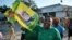 Supporter of the ruling CCM party in Tanzania celebrate after the party’s presidential candidate, John Pombe Magufuli was declared a winner, in Dar es Salaam, Tanzania, Oct. 29, 2015.
