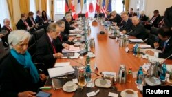 Participants of the G7 finance ministers and central bankers attends a working session in Dresden, Germany, May 28, 2015.