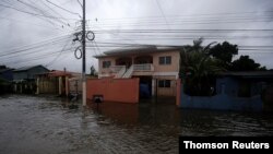 A general view shows a flooded street as Hurricane Eta approaches, in Tela