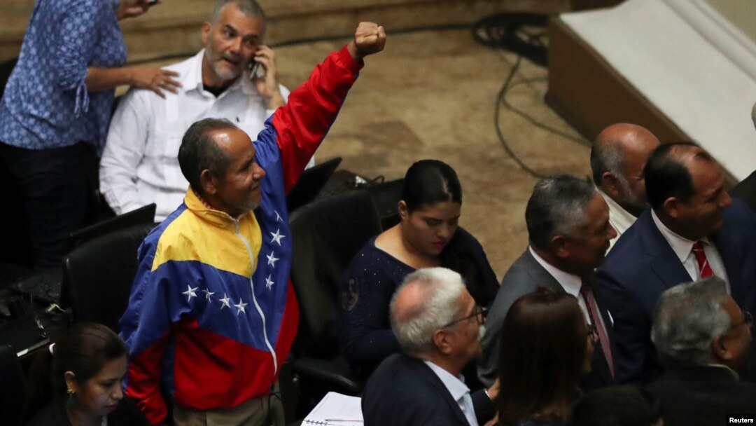Pro-government lawmakers attend a session of Venezuela's National Assembly in Caracas, Venezuela, Sept. 24, 2019.
