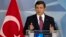 Turkish Prime Minister Ahmet Davutoglu speaks during a media conference at NATO headquarters in Brussels on Nov. 30, 2015.