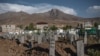 Makeshift headstones in a mountainous Turkey-Iran border region mark the graves of refugees who perished in border areas and shipwrecks as they tried to flee to safety in Turkey, Aug. 11, 2021, in Van, Turkey. (Claire Thomas/VOA)