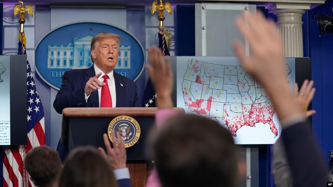 President Donald Trump calls for questions during a news conference at the White House, July 23, 2020.