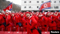 North Korean cheerleaders at a downhill skiing event at the Pyeongchang 2018 Winter Olympics on February 14, 2018.