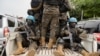 Members of MONUSCO secure the evacuation of non-essential UN staff, following the fight between M23 rebels and FARDC, in Goma