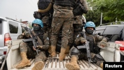 Members of MONUSCO secure the evacuation of non-essential UN staff, following the fight between M23 rebels and FARDC, in Goma