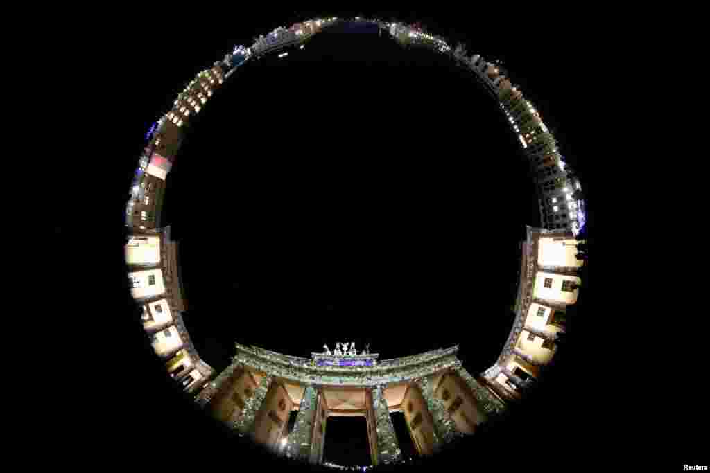 The Brandenburg Gate is illuminated during the Festival of Lights show in Berlin, Germany, Oct. 16, 2019.