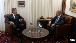 TOPSHOT - This handout photo released by the US State Department on June 10, 2024, shows US Secretary of State Antony Blinken (L) meeting with Israeli Prime Minister Benjamin Netanyahu in Jerusalem on June 10, 2024.