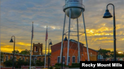 Water tower and the power house, an event venue, at the redeveloped Rocky Mount Mills, in Rocky Mount, North Carolina. (Photo Rocky Mount Mills Instagram) 