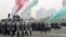 Policemen and members of the Special Weapons and Tactics practice dispersing crowds ahead of next week's 18th National Congress of the Communist Party of China, in Zhengzhou, Henan province, October 30, 2012.