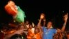 Des fans de l'équipe de football de la Côte d'Ivoire à Abidjan le 4 février 2015.