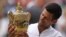 Novak Djokovic holds the winner's trophy after beating Matteo Berrettini during their men's singles final match on the thirteenth day of the 2021 Wimbledon Championships in Wimbledon, July 11, 2010. (Photo by Steven Paston/Pool/AFP)