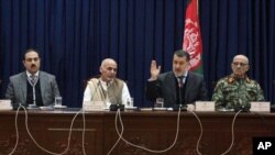 From left, Afghan security officials Mujtaba Patang, Ashraf Ghani Ahmadzai, Besmilah Mohammadi, and Lt. Gen. Sher Mohammad Karimi, address media, Kabul, Dec. 31, 2012.