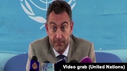 Acting UNMISS head Toby Lanzer tells reporters in Juba on Aug. 28, 2014 that all flights to Bentiu have been grounded following a helicopter crash that killed three Russian crew members.