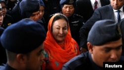 Rosmah Mansor, wife of Malaysia's former Prime Minister Najib Razak, arrives in court in Kuala Lumpur, Malaysia, Oct. 4, 2018.