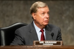 Chair of the Republican-led Senate Judiciary Committee Lindsey Graham of South Carolina prepares to hear testimony from former Deputy Attorney General Rod Rosenstein in the Dirksen Senate Office Building in Washington, June 3, 2020.