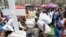 Relatives and friends gather during the funeral of Patrick Ndikumana, July 3, 2015, in Bujumbura, Burundi.