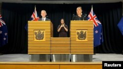 New Zealand's new PM Chris Hipkins and new Deputy PM Carmel Sepuloni attend a news conference after being confirmed as the new Prime Minister and Deputy Prime Minister in Wellington New Zealand, Jan. 22, 2023. 