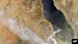 A natural-color image released by NASA shows plumes billowing from Nabro volcano in Eritrea on June 13, 2011