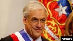 Chile's President Sebastian Pinera waits to receive protocol greetings at La Moneda Presidential Palace in Santiago, Chile, March 11, 2018. 