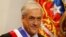 Chile's President Sebastian Pinera waits to receive protocol greetings at La Moneda Presidential Palace in Santiago, Chile, March 11, 2018. 