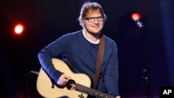 British singer Ed Sheeran performs during the Italian State RAI TV program in Milan, Italy. 