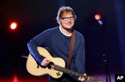 British singer Ed Sheeran performs during the Italian State RAI TV program in Milan, Italy.