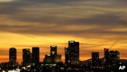 FILE - The Phoenix skyline is seen in this Jan. 31, 2008 photo. Police arrested a man suspected of planning attacks on government buildings in Phoenix and Tucson.