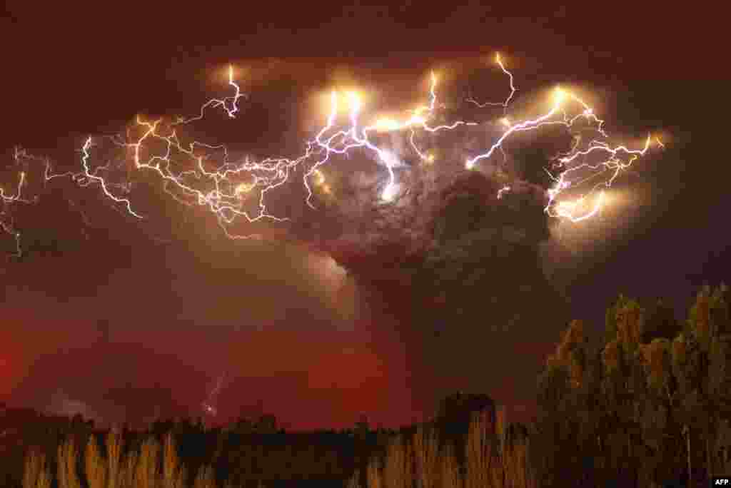 Lightning flashes around the ash plume at the Puyehue-Cordon Caulle volcano chain in Chile. The volcano was dormant for decades before it erupted in June, 2011. (Reuters)