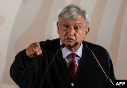 FILE - Mexico's President Andres Manuel Lopez Obrador speaks in Tijuana, Baja California State, Mexico, Jan. 6, 2019.