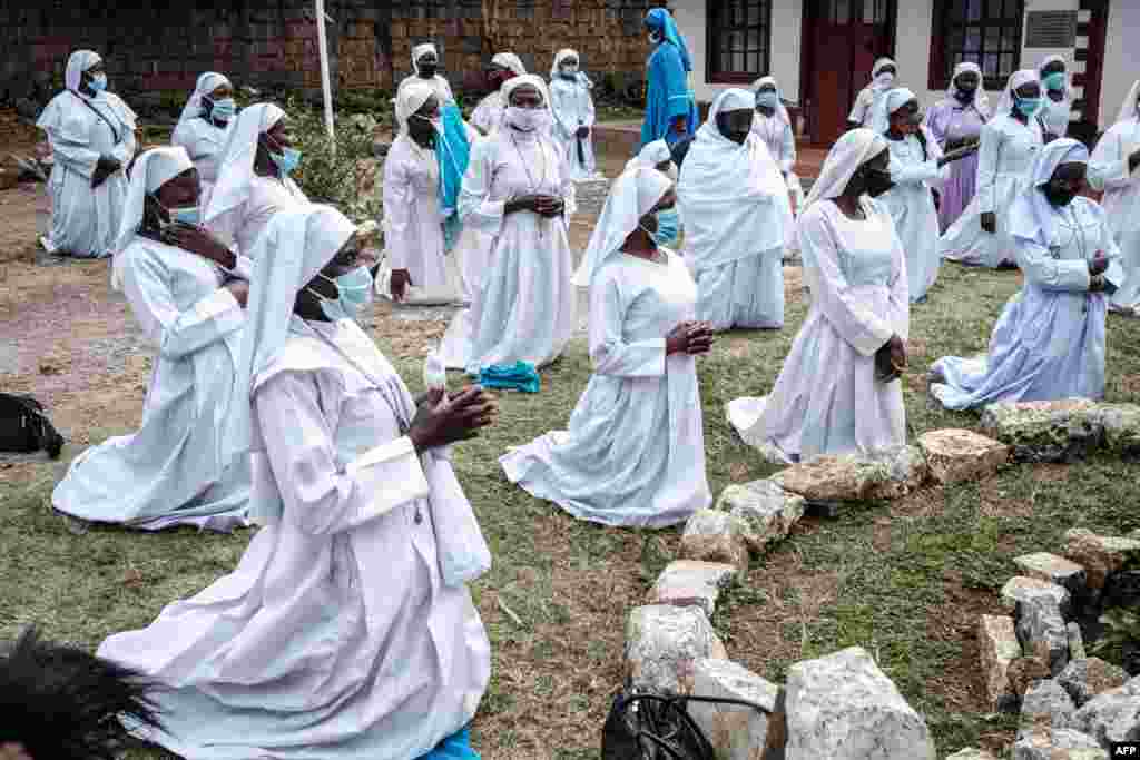 Worshipers of Legio Maria attend a prayer&#160;at their church in the Kebera slum of Nairobi after Kenya&#39;s President Kenyatta directed the places of worship to reopen under strict guidelines to curb the spread of the COVID-19.