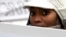 A demonstrator protests outside the City of Westminster Magistrates Court in London during an extradition hearing of Rwandan immigrant Vincent Bajinya, and others, (File photo).