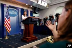 White House press secretary Sarah Huckabee Sanders takes questions during a press briefing at the White House, Sept. 12, 2017.