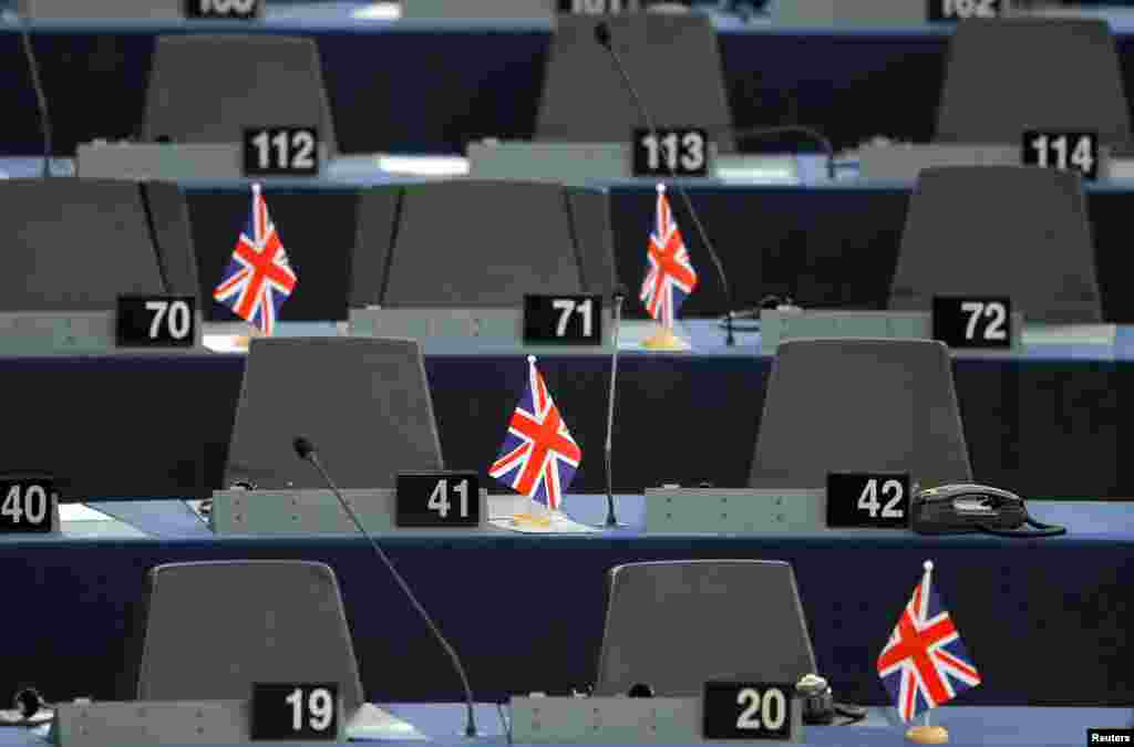 British Union Jack flags are seen on the desks, ahead of a debate on the future of Europe, at the European Parliament in Strasbourg, France.