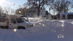 US Communities Clean Up After Massive Snowstorm